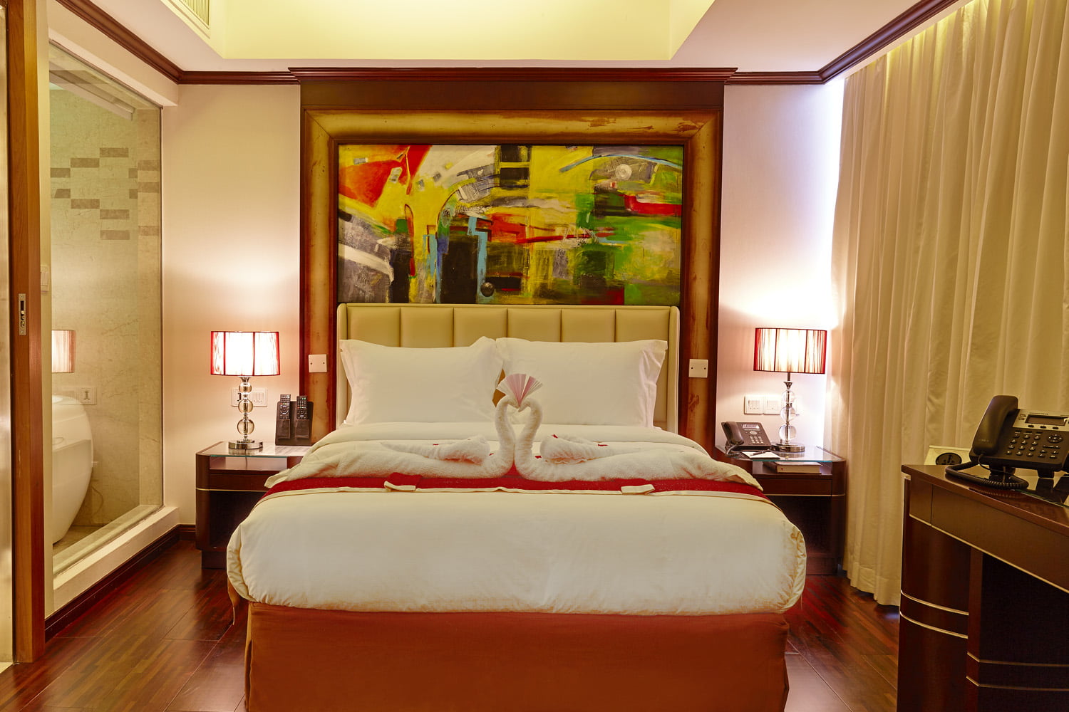 JUNIOR SUITE WITH KITCHENETTE Experience our expansive Junior Suite with a 52 m² range and a fully-equipped kitchen with an induction cooktop. BOOK NOW